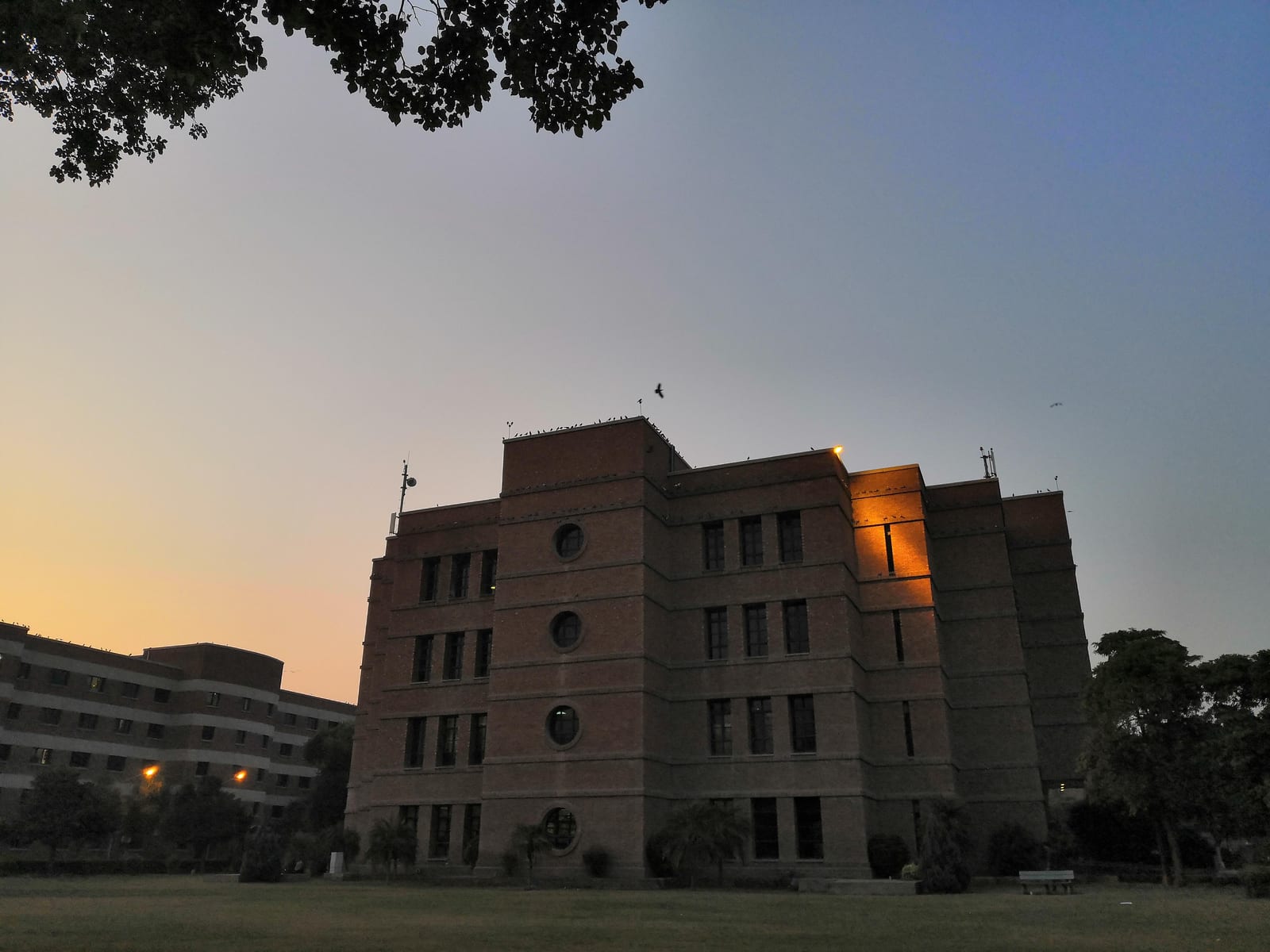 An evening shot of the Gad and Birgit Library at LUMS
