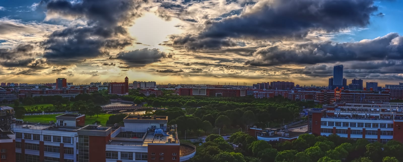 A panorama of a corner of the Shanghai Jiao Tong University school campus under the sunset. The photo was taken in Building A, School of Mechanical Engineering, Shanghai Jiao Tong University, China.